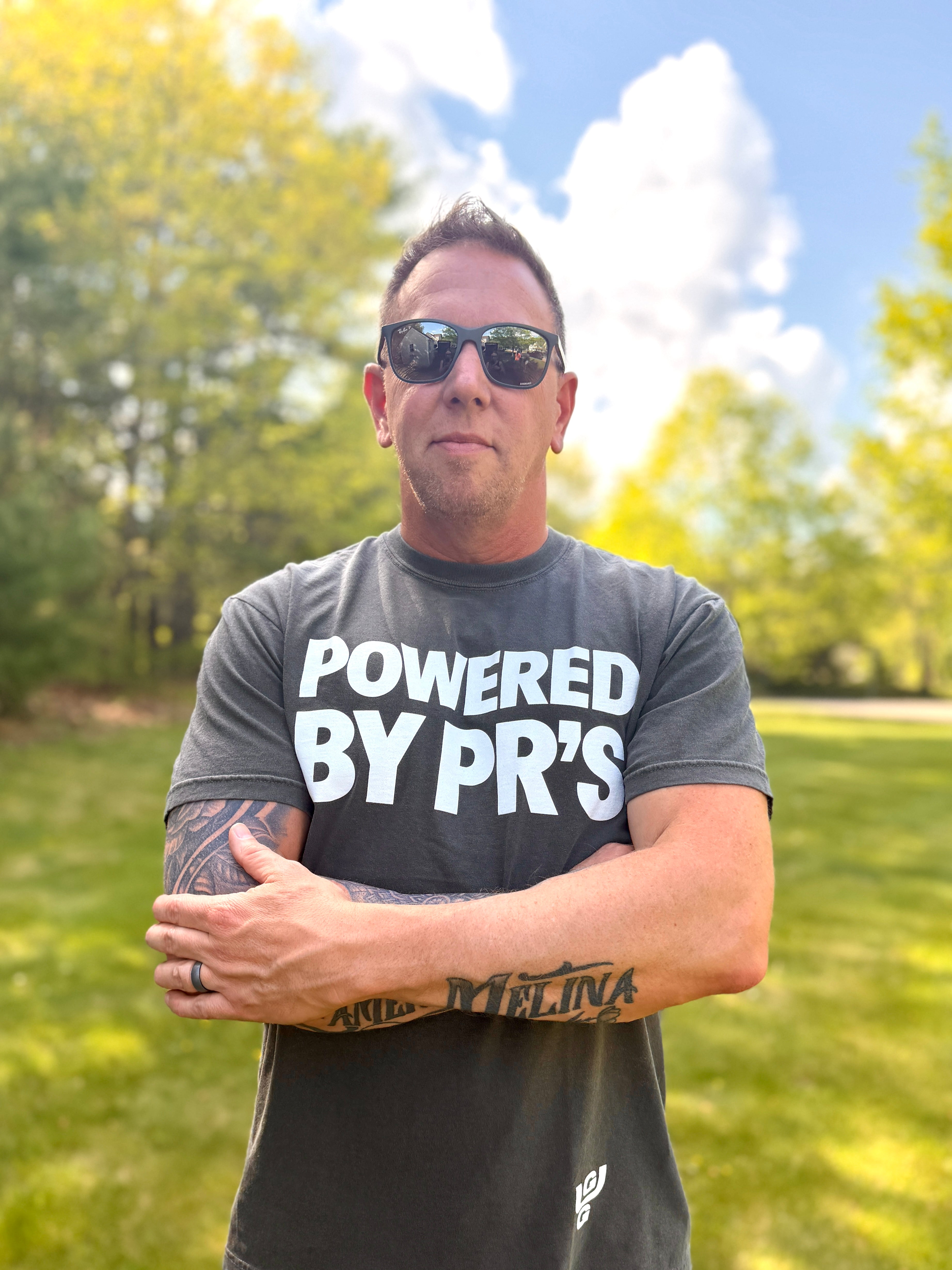 “Powered by PRs” – Unisex Tee